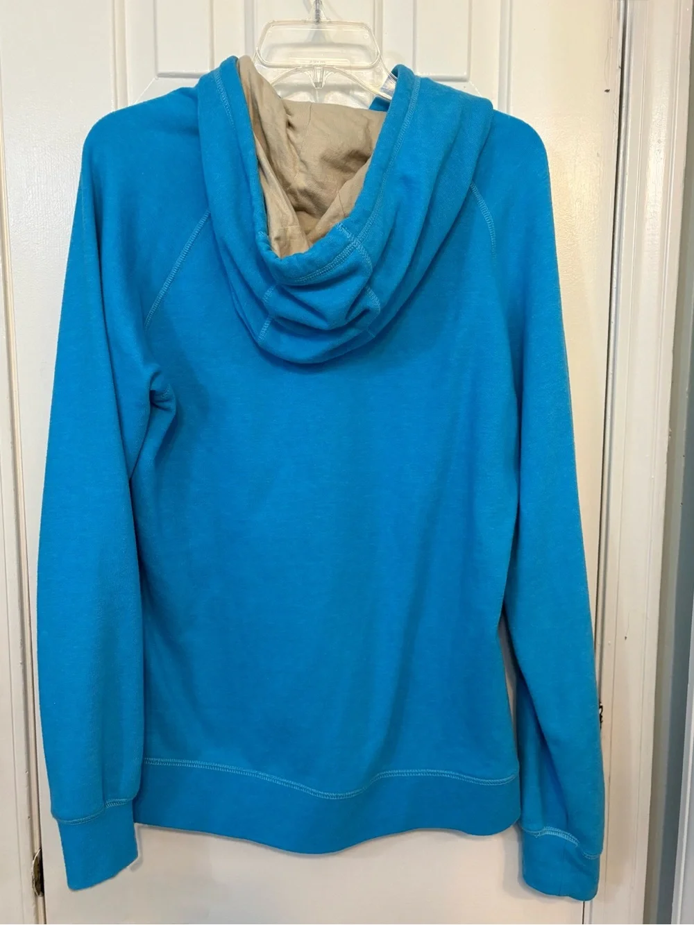 The North Face Turquoise Pullover Hoodie with Cream Logo